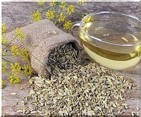 Fennel seed tea that fights gastritis on a nervous background 