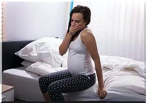 Young woman experiencing pregnancy symptoms