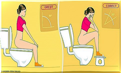 What is the correct position to sit on the toilet?