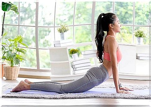 Young woman doing yoga for osteoarthritis